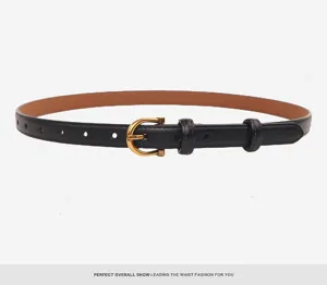 Detailed shot of black leather women belt with golden horseshoe buckle and dual keepers chic design.