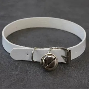 Close-up shot of a white PU leather choker necklace featuring a cute metal bell and buckle.