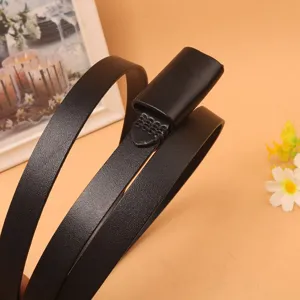 Close-up detail of women's black cowhide thin leather belt showing smooth texture and stitching