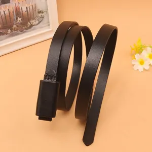 Detailed macro view of a slim black cowhide leather belt for women's dresses.