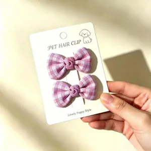 Handmade purple plaid pet hair clips set, cute bowknot hair accessories for dogs and puppies.