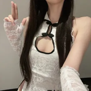 Detailed close-up of sexy white lace hollow dress featuring black piping and matching gloves.