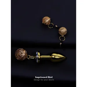 Gold metal butt plug and bell nipple clamps set erotic adult novelty toy for couples.