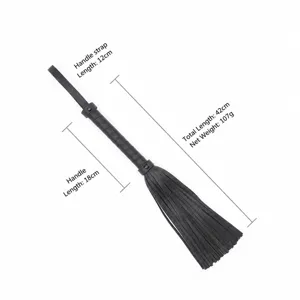 Black leather flogger adult leather whip with comfortable handle and tassel tails for practice.