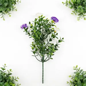 Detail of artificial boxwood branch with small purple and white flowers for garden decor