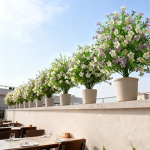 Artificial white and purple baby's breath flowers in pots for outdoor garden decor
