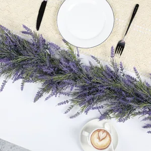 Detail view of artificial lavender garland used as an elegant dining table centerpiece