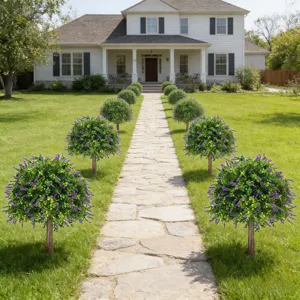Outdoor garden scene featuring artificial lavender topiary trees lining a stone path