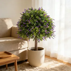 Realistic artificial lavender topiary tree in a stylish, sunlit home interior setting.