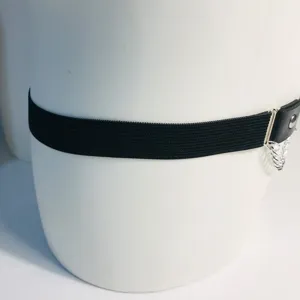 Punk gothic style black elastic leg garter with metal chain detail, ideal accessory.