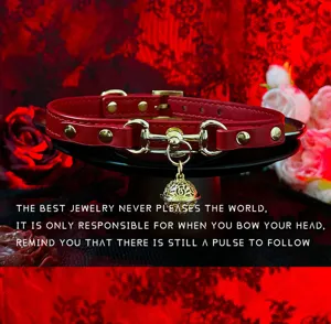 Red leather choker necklace with gold horsebit hardware and cute bell pendant for women.