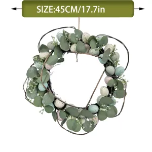 Detail view of a 45cm Easter wreath with faux eucalyptus leaves and colorful eggs