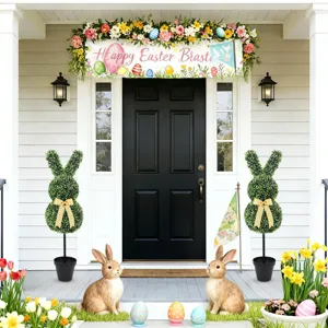 Pair of Easter bunny-shaped artificial boxwood topiaries in pots for porch decor.
