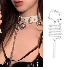 Close-up detail of white PU leather choker necklace featuring cute metal bells and long chain.
