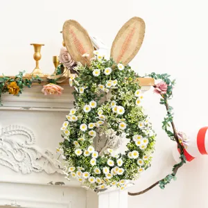 Detailed view of artificial daisy Easter bunny wreath on a vintage fireplace mantel