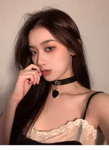 Stylish black heart choker necklace for women, trendy neckband jewelry detail view.