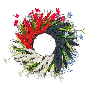 Close-up of red white blue Independence Day wreath with textured artificial flowers