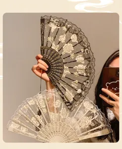 Elegant vintage lace folding fan with floral patterns, perfect for dance, summer, and photo props.