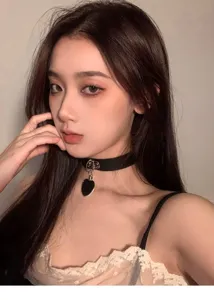 Stylish black choker necklace for women, trendy heart pendant neck chain detail view.