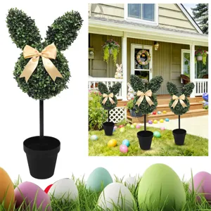 Easter artificial boxwood bunny topiary shown in garden setting with colorful eggs
