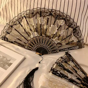 New Chinese style black lace folding fan with gold rose embroidery and elegant tassel.