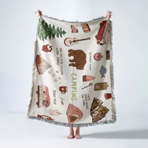 High-quality woven camping throw blanket featuring retro outdoor adventure illustrations.