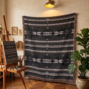 A detailed view of a bohemian ethnic woven blanket hanging in a stylish artist studio setting