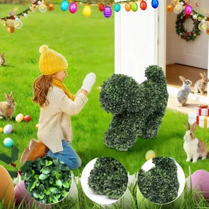 Close-up detail and scenic view of an artificial boxwood poodle topiary for Easter garden