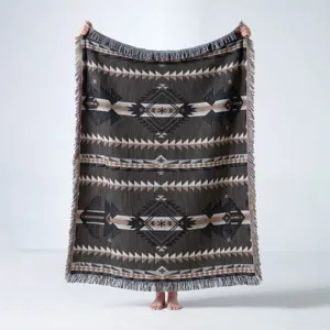 Full view of Bohemian Indian geometric pattern woven throw blanket featuring fringe details