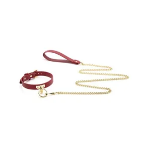 Red faux leather collar with gold chain choker necklace, stylish punk accessory for women.