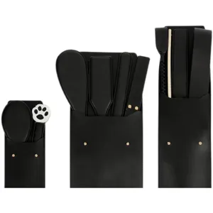 Black leather adult practice props storage set with paddles and whips for versatile collection.