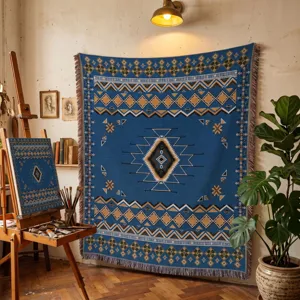 Manta tejida bohemia azul con patrones geométricos en un acogedor estudio