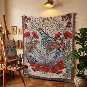 Bohemian woven tapestry blanket displayed in an artist's studio with easel and plant