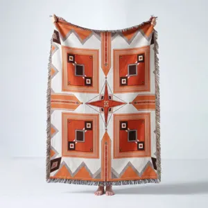 Bohemian orange geometric woven throw blanket with fringe for camping and sofa.