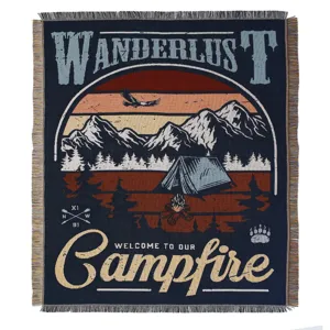 Vintage bohemian woven outdoor camping blanket with mountain campfire and fringe
