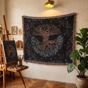 Bohemian Tree of Life woven blanket displayed as a wall tapestry in an art studio