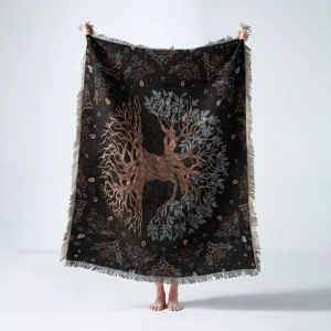 Full view of Bohemian Tree of Life woven blanket with fringe details on white backdrop.