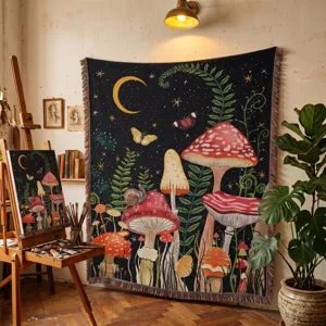 Close-up of bohemian mushroom tapestry blanket with woven tassels in artistic studio