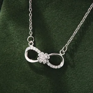 Korean style silver infinity 8-shape necklace with sparkling cubic zirconia and clover charm.