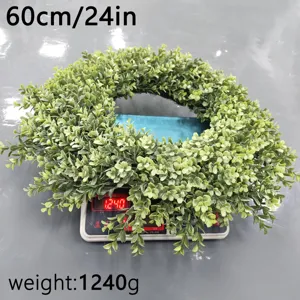 Artificial boxwood wreath on scale showing 1240g weight and 60cm size
