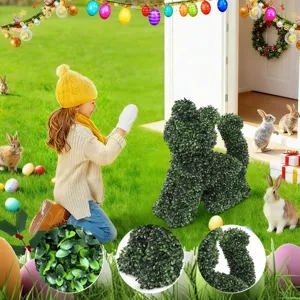 Artificial boxwood dog topiary for Easter garden decoration with close-up leaf details