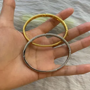 Minimalist diamond paved oval hinged metal bangles in gold and silver finish stylish gift
