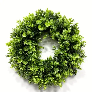 High-quality close-up of artificial green money leaf wreath for spring home decor