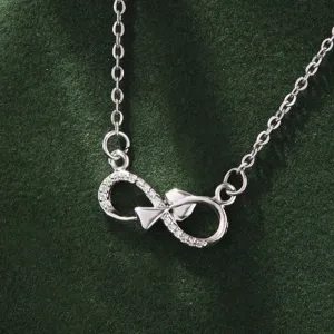Detailed view of the silver infinity symbol necklace, highlighting sparkling zircon stones.