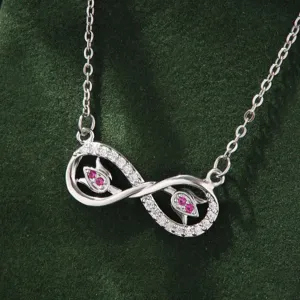 Korean style minimalist infinity symbol necklace with sparkling zirconia and pink stones.