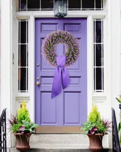 Stunning purple artificial eucalyptus wreath with ribbon on matching front door