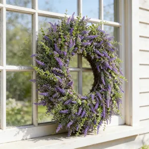Detailed view of artificial lavender wreath on a white rustic window sill
