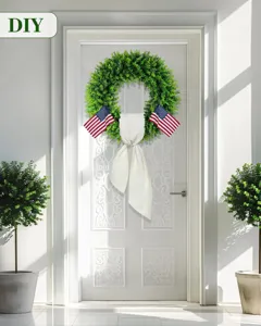 Kunstmatige eucalyptus krans met witte strik en USA vlaggen voor voordeur