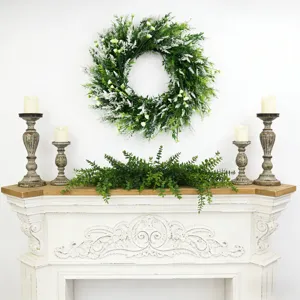 Spring artificial lavender wreath and garland set displayed on a white fireplace mantel