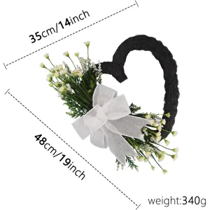 Schwarzer herzförmiger Blumenkranz mit weißer Schleife, 48x35cm und 340g Gewicht.